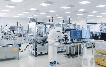 Medical testing facility with personnel in protective suits, highlighting sterile conditions and strict health safety protocols.